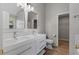 Bathroom featuring double vanity, modern fixtures, and updated flooring at 4625 Thermal Ct, Douglasville, GA 30135