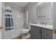 Clean bathroom featuring a shower/tub combo, single sink vanity, and gray paint at 4625 Thermal Ct, Douglasville, GA 30135