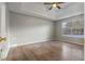 Bedroom with wood floors and a tray ceiling at 4625 Thermal Ct, Douglasville, GA 30135