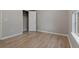 Cozy bedroom with natural light and wood-look flooring at 4625 Thermal Ct, Douglasville, GA 30135