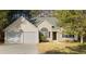 Charming single Gathering home with a two car garage, manicured lawn and delightful curb appeal at 4625 Thermal Ct, Douglasville, GA 30135