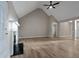 Bright living room featuring a fireplace, high ceilings, and an open floor plan at 4625 Thermal Ct, Douglasville, GA 30135