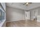 Bedroom featuring tray ceilings and wood flooring at 4625 Thermal Ct, Douglasville, GA 30135