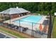 A well-maintained community pool with lounge chairs and umbrellas provides the perfect spot to relax at 4625 Thermal Ct, Douglasville, GA 30135