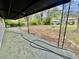 Spacious covered back porch offers an outdoor space with backyard views at 6123 Deerfield Ct, Morrow, GA 30260