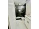 Modern bathroom features a sleek glass shower, vanity and contemporary fixtures at 6123 Deerfield Ct, Morrow, GA 30260