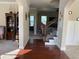 Welcoming foyer with hardwood floors, staircase, and stylish decor at 6802 Potomac, Fairburn, GA 30213
