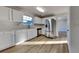 Modern kitchen featuring white cabinets, stainless steel appliances, and hardwood floors at 6808 Foxfire Pl, South Fulton, GA 30349