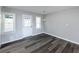 Charming dining room with hardwood floors, natural light, and stylish lighting at 3888 W Oak Dr, Douglasville, GA 30135