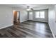 Cozy living room with hardwood floors and neutral walls, creating a comfortable and inviting space at 3888 W Oak Dr, Douglasville, GA 30135