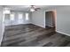 Inviting living room featuring hardwood floors, recessed lights, and plenty of space for relaxation and entertainment at 3888 W Oak Dr, Douglasville, GA 30135