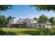 Expansive backyard featuring an in-ground pool, covered patio, and ample green space at 4385 Hickory Flat Hwy, Canton, GA 30115
