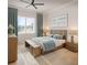 Bright bedroom with hardwood floors, a decorative painting and well appointed decor at 4385 Hickory Flat Hwy, Canton, GA 30115
