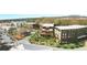 Planned plaza with mixed-use buildings, including residential and commercial spaces, and green landscaping at 4385 Hickory Flat Hwy, Canton, GA 30115