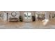 Light-filled foyer with hardwood floors, stylish decor, and views into the dining and kitchen areas at 4385 Hickory Flat Hwy, Canton, GA 30115