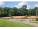 This is a large cleared lot for a home or commercial property on a busy road at 4385 Hickory Flat Hwy, Canton, GA 30115