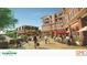 Outdoor plaza with brick buildings, restaurants with outdoor seating, and pedestrian walkways near North St Plaza at 4385 Hickory Flat Hwy, Canton, GA 30115