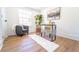 Bright home office with cozy chair and modern desk at 716 Sunfield Nw Dr, Lilburn, GA 30047