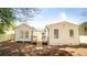 Rear exterior featuring a charming, newly built deck leading to a bright, welcoming blue door at 716 Sunfield Nw Dr, Lilburn, GA 30047