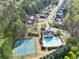 Overhead view showcasing community amenities including tennis courts, playground, and a refreshing swimming pool at 140 Kirkland Dr, Lawrenceville, GA 30044