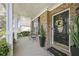 Charming front porch with tasteful decor, including a welcome mat and floral wreath on the door at 140 Kirkland Dr, Lawrenceville, GA 30044