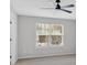 Bedroom with a ceiling fan and window offering natural light at 3417 Sable Chase Ln, Atlanta, GA 30349