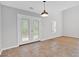 Open dining area with a view of the yard through glass doors at 3417 Sable Chase Ln, Atlanta, GA 30349