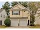 Charming two-story home featuring a two-car garage and a well-maintained lawn at 3417 Sable Chase Ln, Atlanta, GA 30349