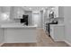 Modern kitchen with white cabinets, stainless steel appliances, and quartz countertops at 3417 Sable Chase Ln, Atlanta, GA 30349