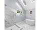 Luxurious bathroom with a soaking tub, marble shower, and skylights, providing a serene and bright space at 420 Longs Peak, Johns Creek, GA 30022