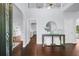 Bright foyer with hardwood floors, high ceilings, and views into the formal dining and living spaces at 420 Longs Peak, Johns Creek, GA 30022