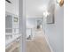 Hallway with glass railing overlooking the living room at 420 Longs Peak, Johns Creek, GA 30022