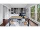 Home office with large window, custom built-ins, and plenty of desk space at 420 Longs Peak, Johns Creek, GA 30022