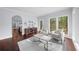 Stylish living room with an open floor plan, hardwood floors, and lots of natural light at 420 Longs Peak, Johns Creek, GA 30022