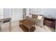 Cozy living room features a neutral color palette and comfortable furnishings for a relaxing atmosphere at 420 Longs Peak, Johns Creek, GA 30022