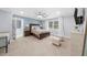 Spacious primary suite with an ensuite bathroom, accent wall, and natural light at 420 Longs Peak, Johns Creek, GA 30022
