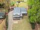 Aerial view showcases the home's layout, roofing, driveway, and surrounding mature landscape at 5361 Seaton Way, Dunwoody, GA 30338