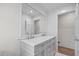 Bathroom with a double sink vanity, white walls, and modern finishes at 5361 Seaton Way, Dunwoody, GA 30338
