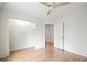 Bedroom featuring hardwood floors and an open closet at 5361 Seaton Way, Dunwoody, GA 30338