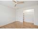 Bedroom featuring hardwood floors and an open closet at 5361 Seaton Way, Dunwoody, GA 30338