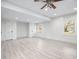 Bonus room with hardwood floors, shiplap walls, recessed lighting, and natural light from windows at 5361 Seaton Way, Dunwoody, GA 30338