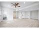 Large bonus room with wood floors and convenient access to the bathroom and closet at 5361 Seaton Way, Dunwoody, GA 30338