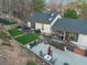 Backyard showing tiered design with patio, green space, and deck at 1445 Bentcreek Dr, Marietta, GA 30062