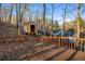 Backyard featuring a small shed and trees at 1445 Bentcreek Dr, Marietta, GA 30062