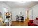 Bedroom featuring hardwood floors, large window, lighting, and doorway at 1445 Bentcreek Dr, Marietta, GA 30062