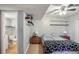 The bedroom features hardwood floors, a ceiling fan, and access to an ensuite bathroom at 1445 Bentcreek Dr, Marietta, GA 30062