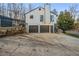 Modern two-story home with a two-car garage and ample driveway space at 1445 Bentcreek Dr, Marietta, GA 30062