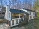 Charming two-story home with a front-facing garage and a well-maintained lawn at 1445 Bentcreek Dr, Marietta, GA 30062