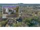 Beautiful home with lovely trees and landscaping around the property on a sunny day at 1445 Bentcreek Dr, Marietta, GA 30062