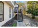Side angled view of house and porch entrance, with a well-kept walkway at 1445 Bentcreek Dr, Marietta, GA 30062